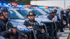 Policias de Cancun camara de solapa 4
