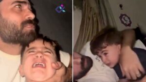 Padre protege y tranquiliza a su hijo en pleno bombardeo en Gaza
